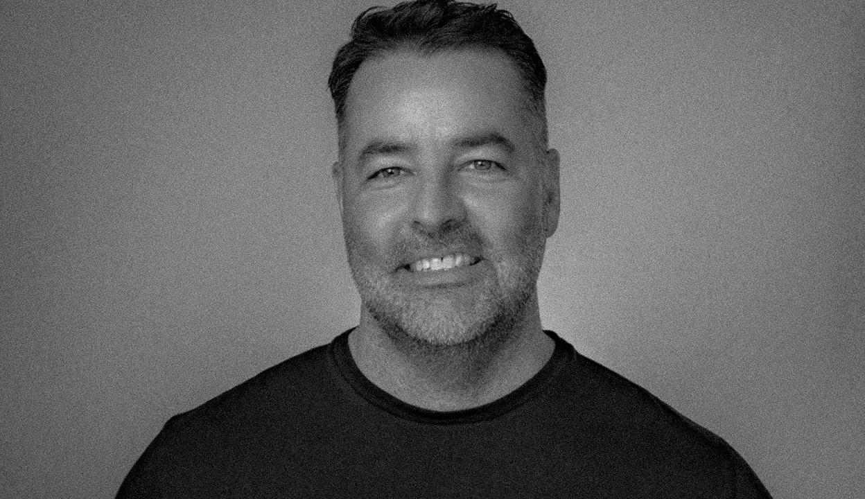 Jason Warner smiles at the camera.